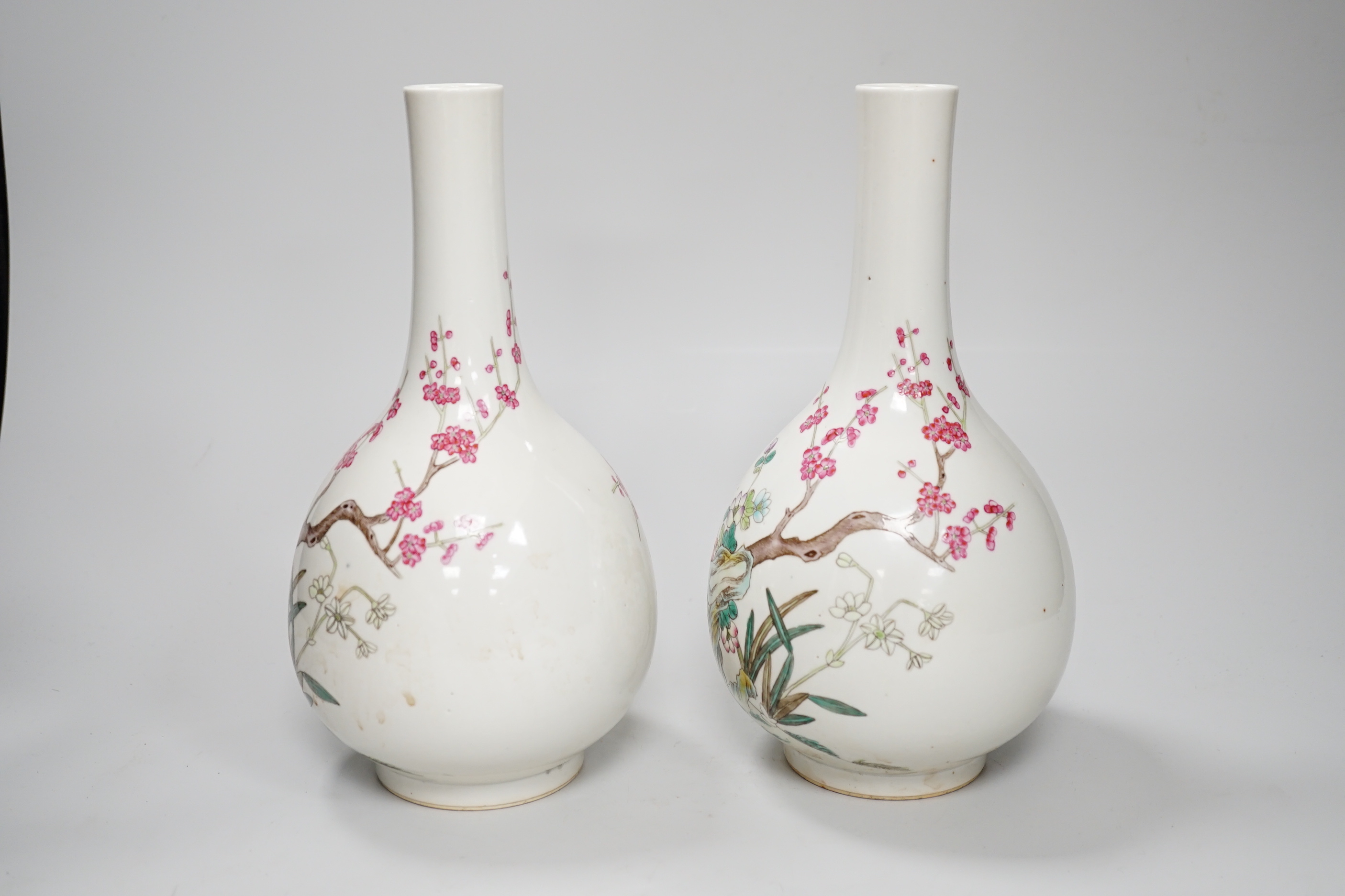 A pair of Chinese famille rose vases, 25cm